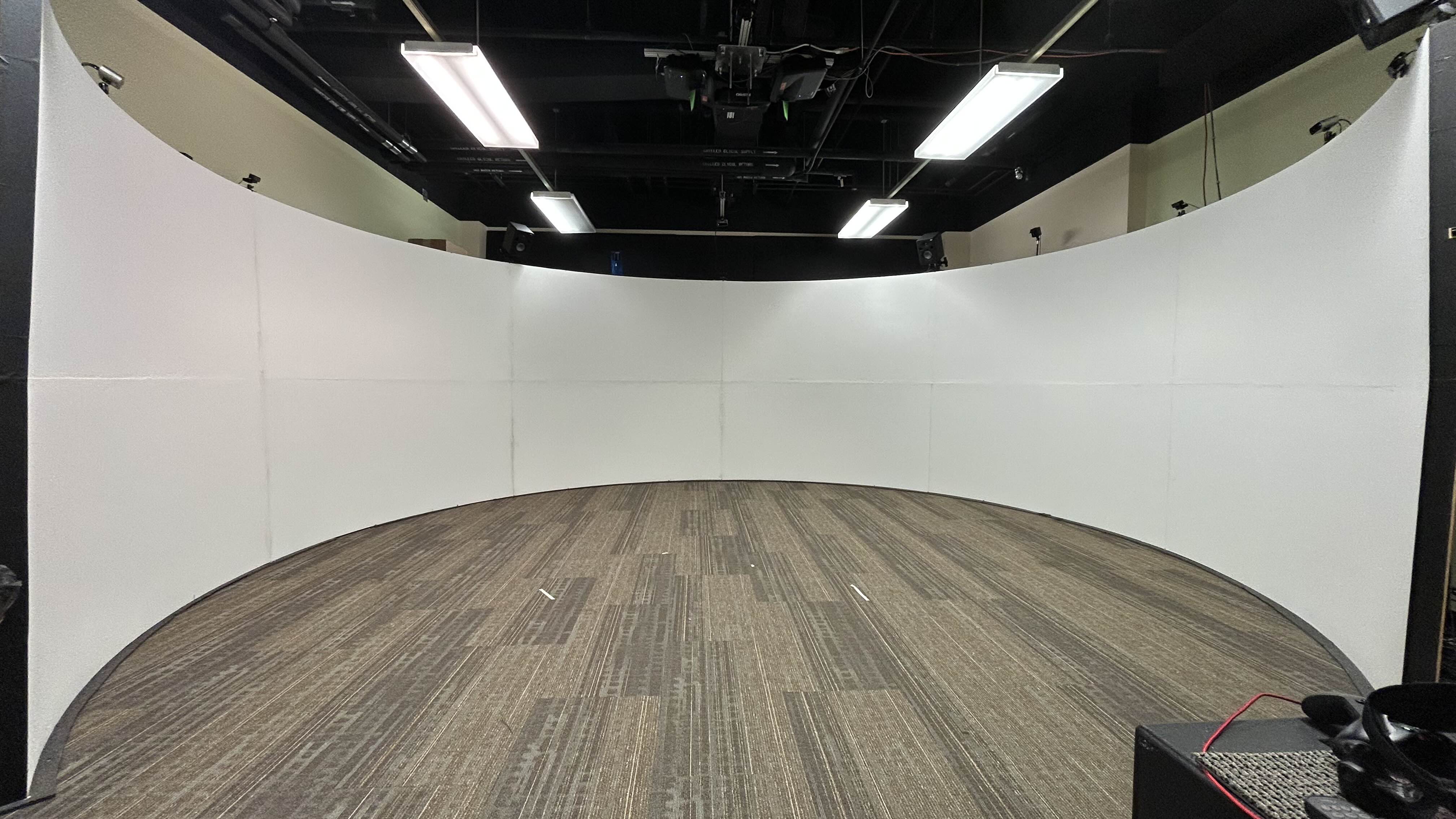 A 3D cylinder mesh on a plane with uv coordinates.